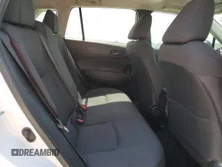 2024 Toyota Corolla Cross LE with VIN 7MUCAAAG7RV090677, listed as a Copart auction lot 57615565 with 6,910 mi miles and Salvage title. Bid and sale history available at DreamBid. Image 11.