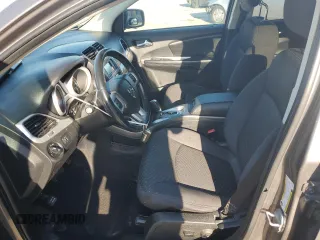 2013 Dodge Journey SXT with VIN 3C4PDCBG0DT522408, listed as a Copart auction lot 62699195 with 130,665 mi miles and Salvage title. Bid and sale history available at DreamBid. Image 7.