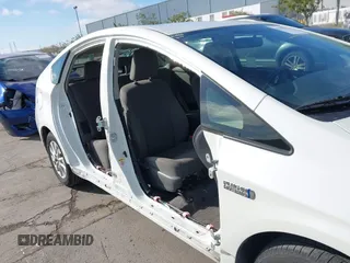 2014 Toyota Prius z VIN JTDKN3DP6E3060728, wystawiony jako IAAI lot #41993542 z przebiegiem 149 891 mil mil oraz . Historia ofert i sprzedaży dostępna na DreamBid. Obrazek 6.
