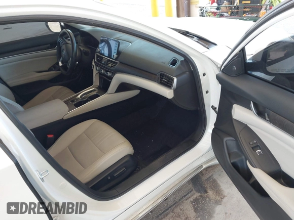 2022 Honda Accord Touring with VIN 1HGCV3F90NA011671, listed as a IAAI auction lot 42743890 with 76,728 mi miles and . Bid and sale history available at DreamBid. Image 5.