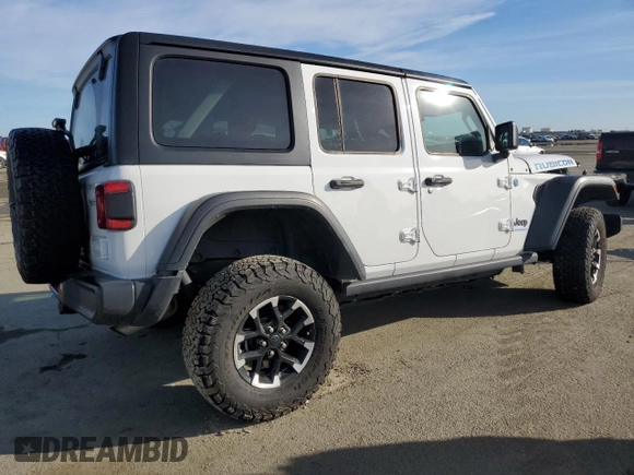 2024 Jeep Wrangler Rubicon with VIN 1C4RJXR6XRW115879, listed as a Copart auction lot 45816825 with 34,557 mi miles and Salvage Title. Bid and sale history available at DreamBid. Image 3.