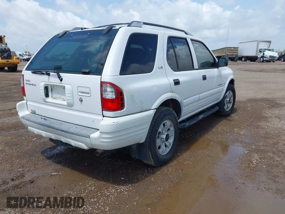 2001 Isuzu Rodeo S with VIN 4S2CK58W414357404, listed as a IAAI auction lot 42479053 with Not provided miles and . Bid and sale history available at DreamBid. Image 4.