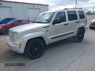 2009 Jeep Liberty Sport with VIN 1J8GN28K39W520228, listed as a IAAI auction lot 41961381 with 196,187 mi miles. Bid and sale history available at carsss.com. Image 2.