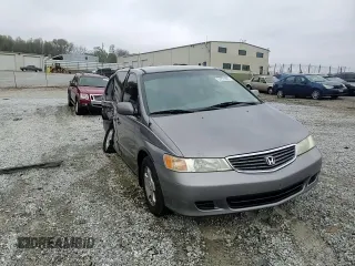 2000 Honda Odyssey EX with VIN 2HKRL1865YH513885, listed as a Copart auction lot 50223505 with 214,627 mi miles and Salvage Title. Bid and sale history available at DreamBid. Image 11.