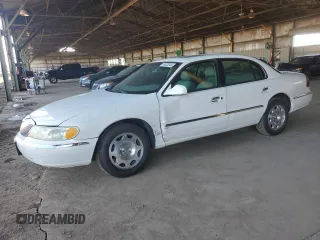 2001 Lincoln Continental with VIN 1LNHM97V31Y622782, listed as a Copart auction lot 74023344 with 116,672 mi miles and Salvage Title. Bid and sale history available at carsss.com. Image 1.