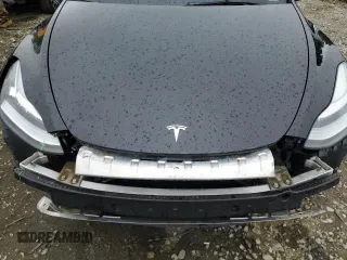 2022 Tesla Model Y Long Range z VIN 7SAYGDEE2NF313492, wystawiony jako Copart lot #55748695 z przebiegiem Nie podano mil oraz Szkoda całkowita • Salvage title. Historia ofert i sprzedaży dostępna na DreamBid. Obrazek 11.