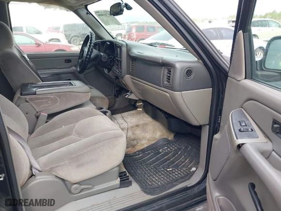 2005 GMC Yukon SLT with VIN 1GKEC13T75R144645, listed as a IAAI auction lot 41703999 with 222,585 mi miles. Bid and sale history available at carsss.com. Image 5.