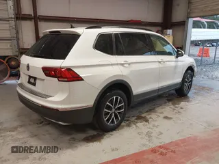 2020 Volkswagen Tiguan SE with VIN 3VV3B7AX4LM141023, listed as a IAAI auction lot 41521923 with 69,479 mi miles and . Bid and sale history available at DreamBid. Image 4.