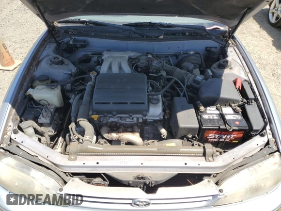 1995 Toyota Camry z VIN 4T1GK12C7SU099655, wystawiony jako Copart lot #58421895 z przebiegiem 89 299 mil mil oraz Czysty tytuł • Clean title. Historia ofert i sprzedaży dostępna na DreamBid. Obrazek 11.