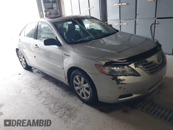 2007 Toyota Camry z VIN JTNBB46K973038138, wystawiony jako IAAI lot #42233680 z przebiegiem 230 480 mil mil oraz . Historia ofert i sprzedaży dostępna na DreamBid. Obrazek 1.