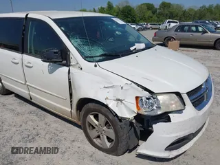 2013 Dodge Grand Caravan SE with VIN 2C4RDGBG9DR516044, listed as a IAAI auction lot 41998893 with 214,645 mi miles and . Bid and sale history available at DreamBid. Image 6.