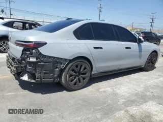 2023 BMW 7 Series 740i with VIN WBA23EH05PCM61539, listed as a Copart auction lot 58013225 with 16,242 mi miles and Salvage title. Bid and sale history available at DreamBid. Image 3.