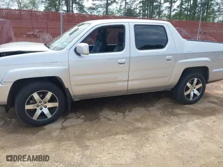 2014 Honda Ridgeline SE with VIN 5FPYK1F62EB013329, listed as a IAAI auction lot 41876728 with 127,014 mi miles. Bid and sale history available at carsss.com. Image 14.
