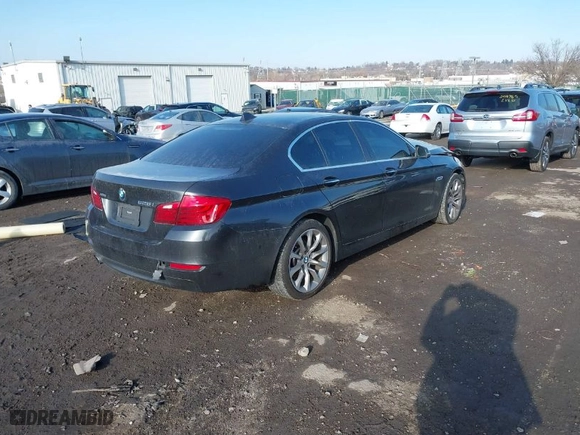 2015 BMW 5 Series 528i xDrive with VIN WBA5A7C55FG142666, listed as a IAAI auction lot 41183686 with 118,325 mi miles. Bid and sale history available at carsss.com. Image 4.