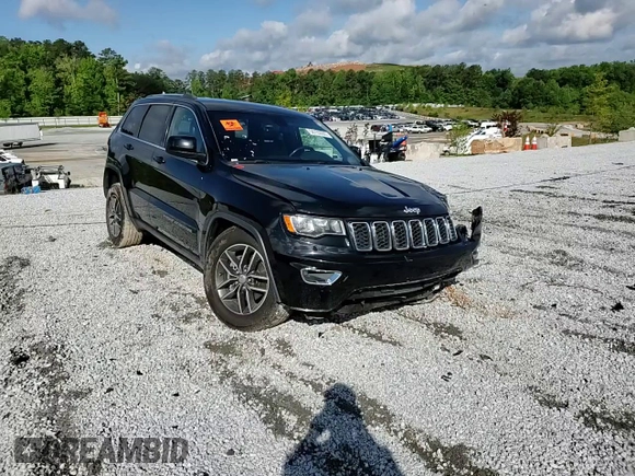 2018 Jeep Grand Cherokee Laredo E with VIN 1C4RJEAGXJC246874, listed as a Copart auction lot 56722005 with 101,493 mi miles and Salvage title. Bid and sale history available at DreamBid. Image 14.