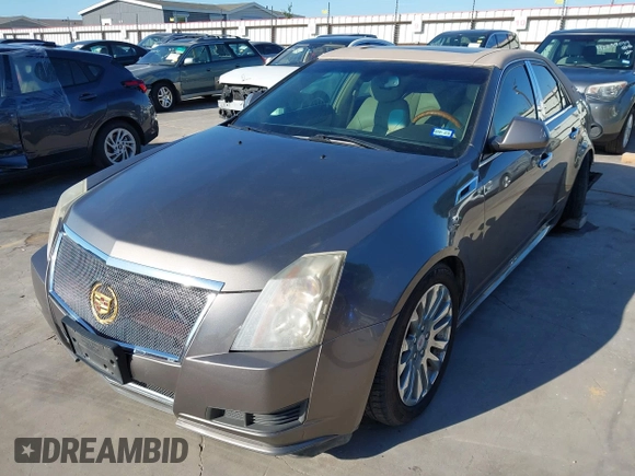 2012 Cadillac CTS Luxury z VIN 1G6DF5E58C0142041, wystawiony jako IAAI lot #42235864 z przebiegiem 59 697 mil mil oraz . Historia ofert i sprzedaży dostępna na DreamBid. Obrazek 2.