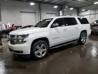 2017 Chevrolet Suburban Premier with VIN 1GNSKJKC1HR131632, listed as a Copart auction lot 49453455 with 140,325 mi miles and Salvage Title. Bid and sale history available at DreamBid. Image 1.