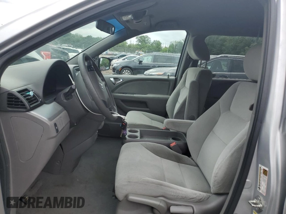 2010 Honda Odyssey LX with VIN 5FNRL3H2XAB059078, listed as a Copart auction lot 61144895 with 116,724 mi miles and Salvage title. Bid and sale history available at DreamBid. Image 7.