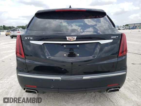 2020 Cadillac XT5 Luxury FWD z VIN 1GYKNAR49LZ197878, wystawiony jako Copart lot #54727524 z przebiegiem 37 990 mil mil oraz Nie do naprawy • Non repairable. Historia ofert i sprzedaży dostępna na DreamBid. Obrazek 6.