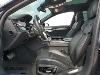 2020 Audi S8 z VIN WAU8SAF82LN003857, wystawiony jako Copart lot #56081794 z przebiegiem 11 298 mil mil oraz Szkody całkowita. Historia ofert i sprzedaży dostępna na DreamBid. Obrazek 7.
