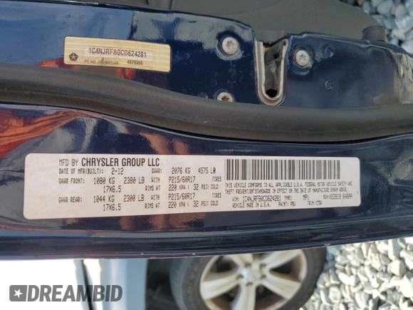 2012 Jeep Patriot Latitude with VIN 1C4NJRFB0CD624281, listed as a Copart auction lot 53113805 with 131,030 mi miles and Salvage Title. Bid and sale history available at carsss.com. Image 12.