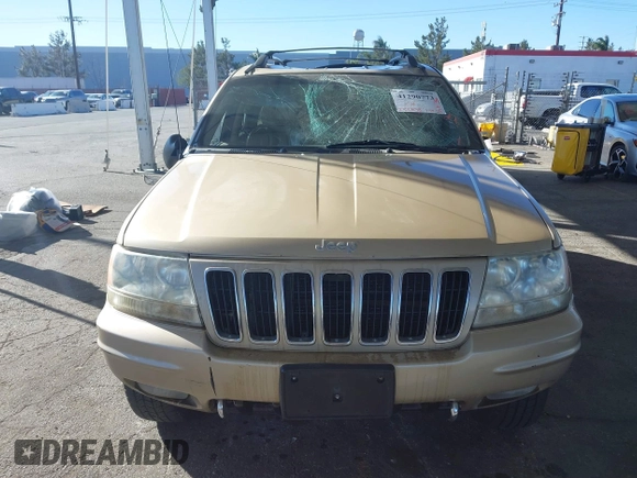 1999 Jeep Grand Cherokee Limited with VIN 1J4GW68NXXC727844, listed as a IAAI auction lot 41290773 with 222,838 mi miles. Bid and sale history available at carsss.com. Image 6.
