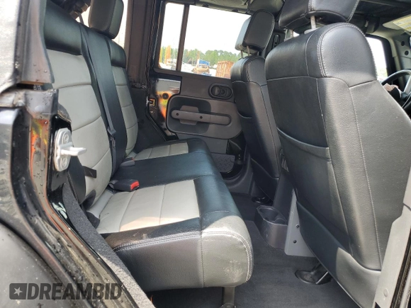 2008 Jeep Wrangler Unlimited Sahara with VIN 1J4GA59178L607960, listed as a Copart auction lot 57855995 with 122,913 mi miles and Salvage title. Bid and sale history available at DreamBid. Image 11.