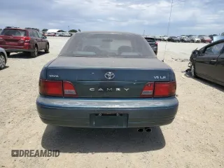 1996 Toyota Camry LE with VIN 4T1BF12K5TU861825, listed as a Copart auction lot 59803174 with 217,650 mi miles and Salvage title. Bid and sale history available at DreamBid. Image 6.