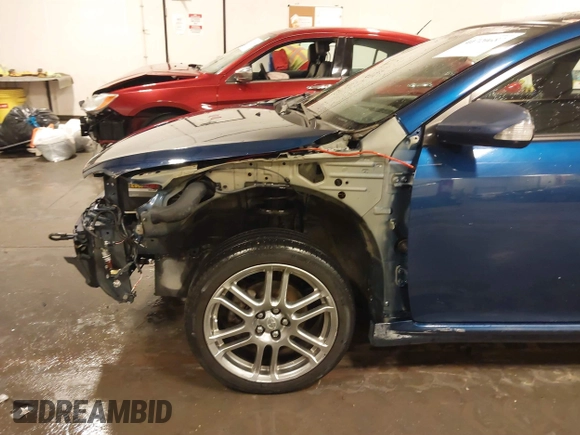 2009 Scion tC with VIN JTKDE167990297921, listed as a IAAI auction lot 41720687 with 159,960 mi miles. Bid and sale history available at carsss.com. Image 18.