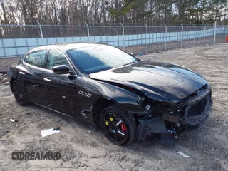 2018 Maserati Quattroporte S Q4 GranSport z VIN ZAM56YRS3J1291799, wystawiony jako IAAI lot #41606266 z przebiegiem 49 500 mil mil oraz . Historia ofert i sprzedaży dostępna na DreamBid. Obrazek 1.