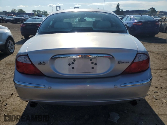 2002 Jaguar S-Type with VIN SAJDA01P52GM27504, listed as a Copart auction lot 57850944 with 119,707 mi miles and Clean Title. Bid and sale history available at DreamBid. Image 6.