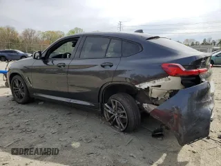 2019 BMW X4 M40i with VIN 5UXUJ5C5XKLJ64004, listed as a Copart auction lot 52106895 with 74,599 mi miles and Salvage title. Bid and sale history available at DreamBid. Image 2.