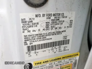 2013 Ford Expedition XLT z VIN 1FMJU1J51DEF09236, wystawiony jako Copart lot #57498685 z przebiegiem 266 883 mil mil oraz Szkoda całkowita • Salvage title. Historia ofert i sprzedaży dostępna na DreamBid. Obrazek 13.