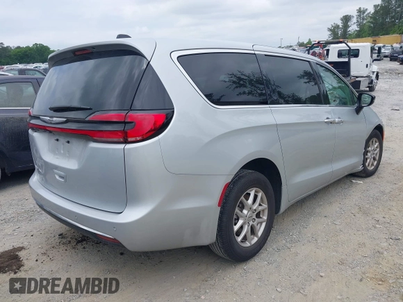 2024 Chrysler Pacifica Touring L with VIN 2C4RC1BG8RR139066, listed as a IAAI auction lot 42150531 with 18,777 mi miles and . Bid and sale history available at DreamBid. Image 4.