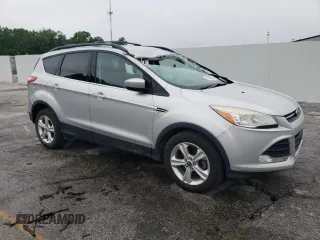 2013 Ford Escape SE with VIN 1FMCU0GX7DUB00465, listed as a Copart auction lot 58265705 with 227,613 mi miles and Salvage title. Bid and sale history available at DreamBid. Image 4.