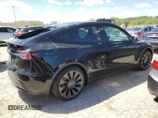 2023 Tesla Model Y Performance z VIN 7SAYGDEFXPF948763, wystawiony jako Copart lot #50562134 z przebiegiem 948 mil mil oraz Szkoda całkowita • Salvage title. Historia ofert i sprzedaży dostępna na DreamBid. Obrazek 3.