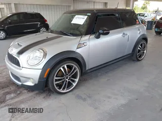 2008 MINI Hardtop S with VIN WMWMF73548TV35548, listed as a IAAI auction lot 42521348 with 104,427 mi miles and . Bid and sale history available at DreamBid. Image 2.
