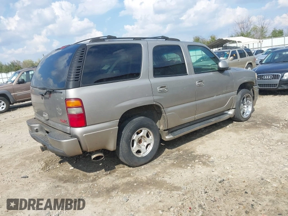 2002 GMC Yukon Denali z VIN 1GKEK63U52J202688, wystawiony jako IAAI lot #41778920 z przebiegiem 354 202 mil mil oraz . Historia ofert i sprzedaży dostępna na DreamBid. Obrazek 4.
