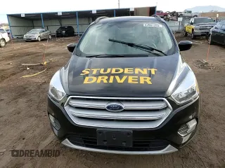 2018 Ford Escape SE z VIN 1FMCU9GDXJUD21466, wystawiony jako Copart lot #46266395 z przebiegiem Nie podano mil oraz Szkoda całkowita • Salvage title. Historia ofert i sprzedaży dostępna na DreamBid. Obrazek 11.