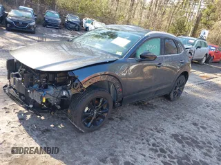 2025 Mazda CX-30 S Select Sport z VIN 3MVDMBBM4SM752011, wystawiony jako IAAI lot #41505023 z przebiegiem 1 601 mil mil oraz . Historia ofert i sprzedaży dostępna na DreamBid. Obrazek 18.