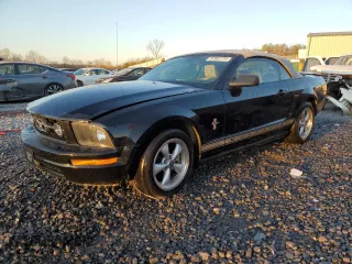 2008 Ford Mustang Deluxe with VIN 1ZVHT84N985180475, listed as a Copart auction lot 87002774 with 124,015 mi miles and Salvage Title. Bid and sale history available at carsss.com. Image 1.