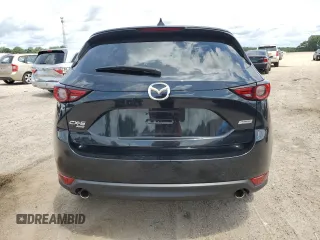2018 Mazda CX-5 Grand Touring с VIN JM3KFBDM0J0362967, выставлен на аукционе Copart как лот 60288665 с пробегом 137 241 миль миль и Списание • Salvage title. История ставок и продаж доступна на DreamBid. Изображение 6.