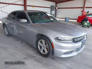 2015 Dodge Charger SE with VIN 2C3CDXBG1FH840060, listed as a IAAI auction lot 42111676 with 165,479 mi miles and . Bid and sale history available at carsss.com. Image 1.