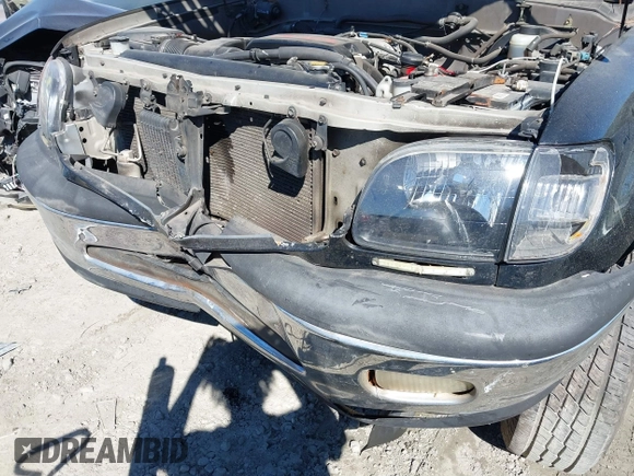2001 Toyota Tundra SR5 with VIN 5TBRT34171S133199, listed as a IAAI auction lot 41677010 with 321,658 mi miles and . Bid and sale history available at DreamBid. Image 6.
