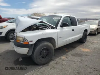 1998 Dodge Dakota SLT with VIN 1B7GL22X0WS654957, listed as a Copart auction lot 48569595 with 0 mi miles and Salvage Title. Bid and sale history available at carsss.com. Image 1.