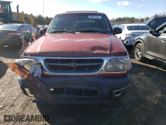1999 Ford Explorer XLT with VIN 1FMDU34E7XZA60386, listed as a Copart auction lot 86851594 with 218,592 mi miles and Salvage title. Bid and sale history available at DreamBid. Image 5.