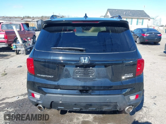 2023 Honda Passport Elite with VIN 5FNYF8H04PB006514, listed as a IAAI auction lot 41537826 with 14,640 mi miles and . Bid and sale history available at DreamBid. Image 17.