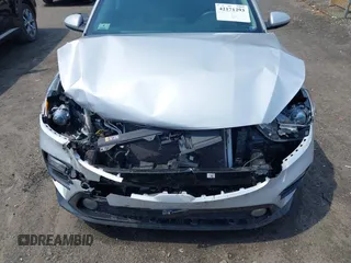 2021 Kia Forte LXS z VIN 3KPF24AD2ME333097, wystawiony jako IAAI lot #42171293 z przebiegiem 29 875 mil mil oraz . Historia ofert i sprzedaży dostępna na DreamBid. Obrazek 6.