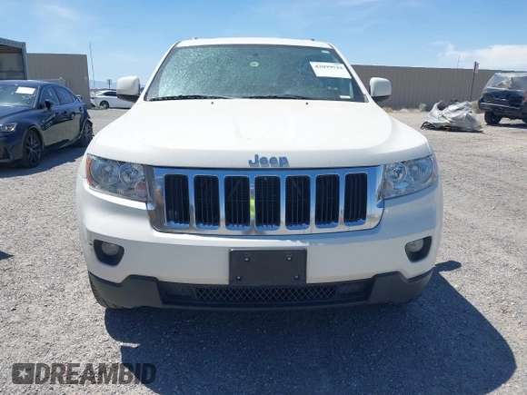 2012 Jeep Grand Cherokee Laredo with VIN 1C4RJEAG0CC210274, listed as a IAAI auction lot 42099944 with 177,527 mi miles. Bid and sale history available at carsss.com. Image 6.