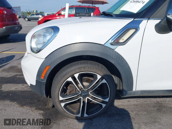 2012 MINI Countryman S with VIN WMWZC3C56CWL82122, listed as a IAAI auction lot 42600474 with 71,920 mi miles and . Bid and sale history available at DreamBid. Image 12.